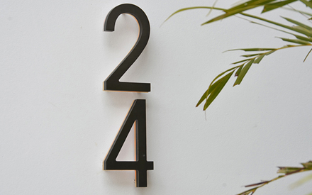Modern Bronze House Numbers Illuminated by Luxello LED Signage