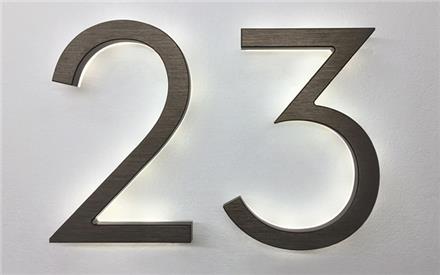 Modern neutra 8" bronze backlit numbers by Luxello LED Signage Modern neutra 8" bronze backlit numbers by Luxello LED Signage