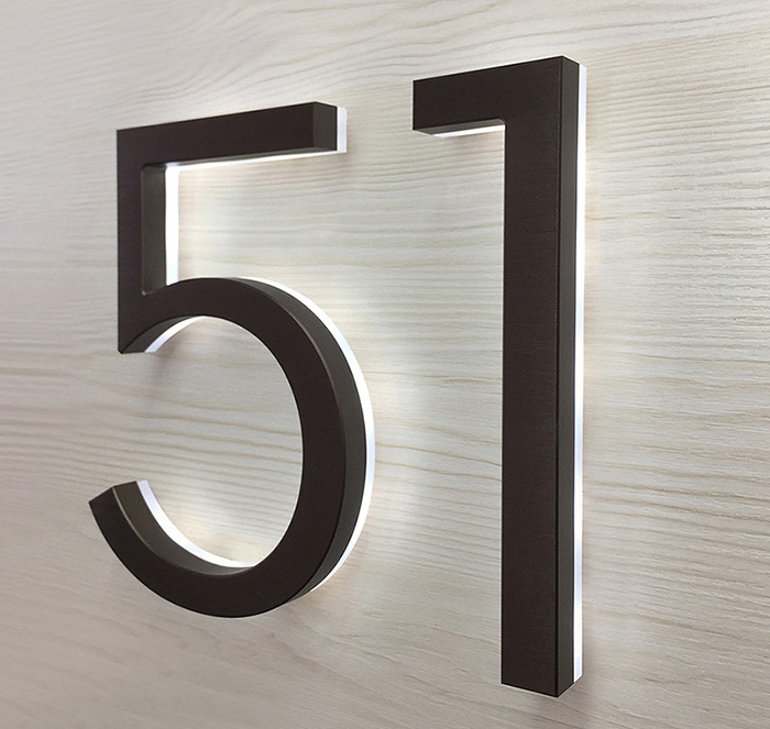Modern neutra 8" bronze backlit numbers by Luxello LED Signage Modern neutra 8" bronze backlit numbers by Luxello LED Signage