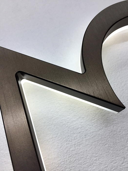 Modern neutra 8" bronze backlit numbers by Luxello LED Signage Modern neutra 8" bronze backlit numbers by Luxello LED Signage